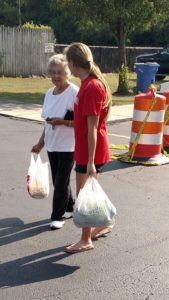 The program not only helps girls with personal and professional develop, but also gives back to the community. (Photo by DYW - DeKalb) 