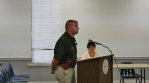 Chief Deputy Michael Edmondson presenting personnel requests from the Sheriff's Office. (Photo by Tyler Pruett)