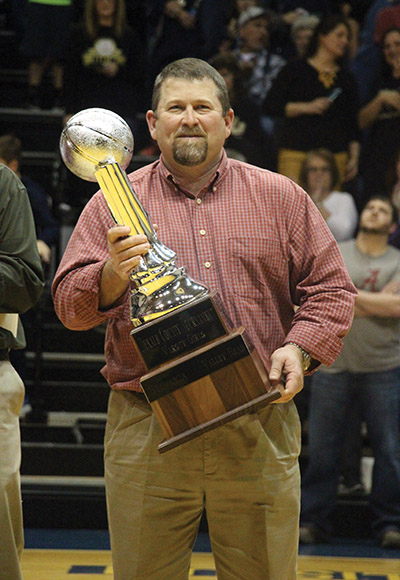 The Dekalb County Basketball Girls trophy Is named after Coach Mike Cochran