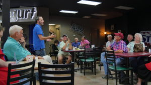 Marshall Stiefel, candidate for Rainsville City Council Place 1, assures the crowd that he's for doing anything to help the city grow. (Photo by Tyler Pruett) 