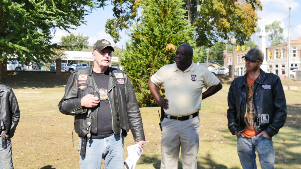 Johnny Vaughn, President of Bikers Urban Response Needed, addresses the volunteers, along with Fort Payne Police Chief Randy Bynum. (Tyler Pruett | Southern Torch) 