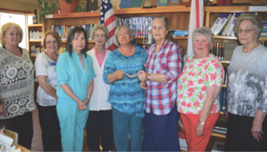 Ider HCL Presents Grant to Library