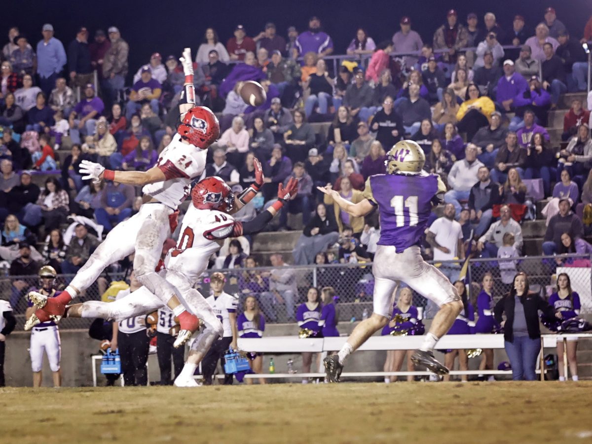 Red Devils Squash the Yellowjackets