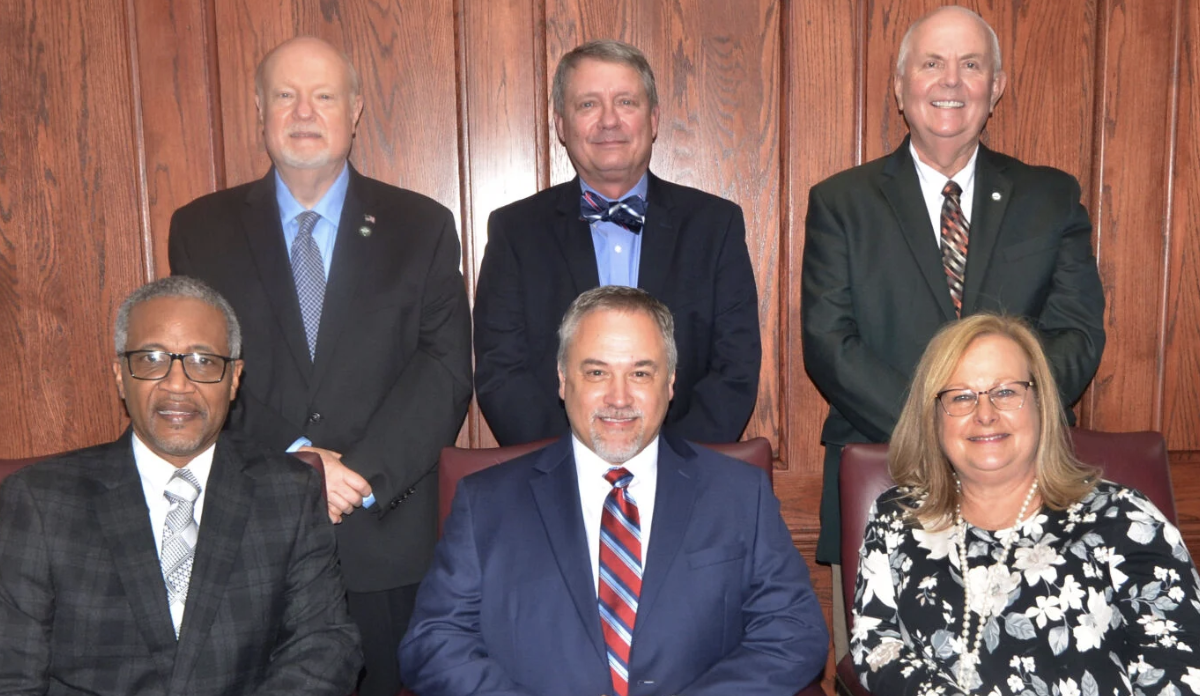 Council members serving on boards issue tabled