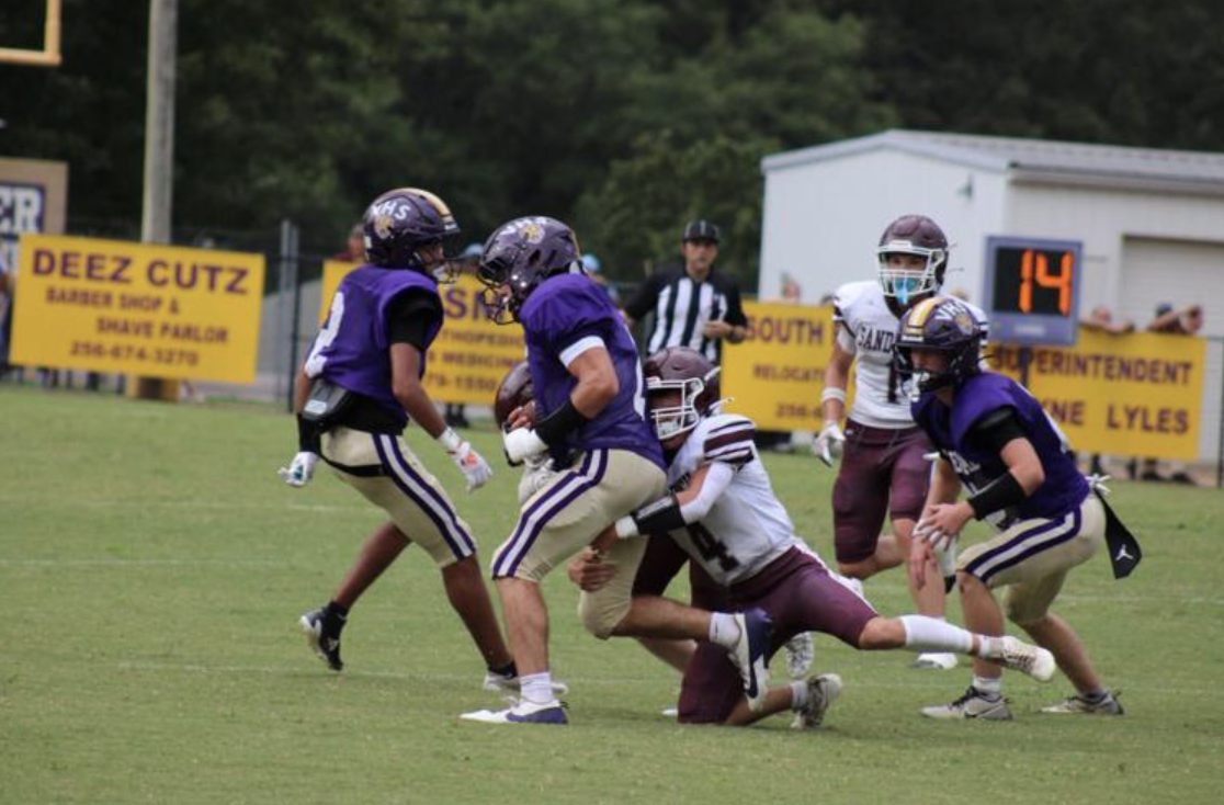 Tigers defeated Sand Rock but fell to Coosa