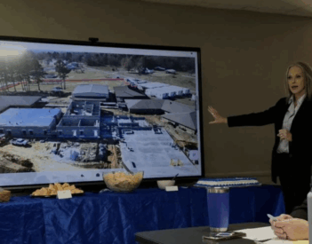 Superintendent Reviews Construction Progress